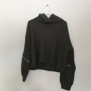 green turtleneck sweater